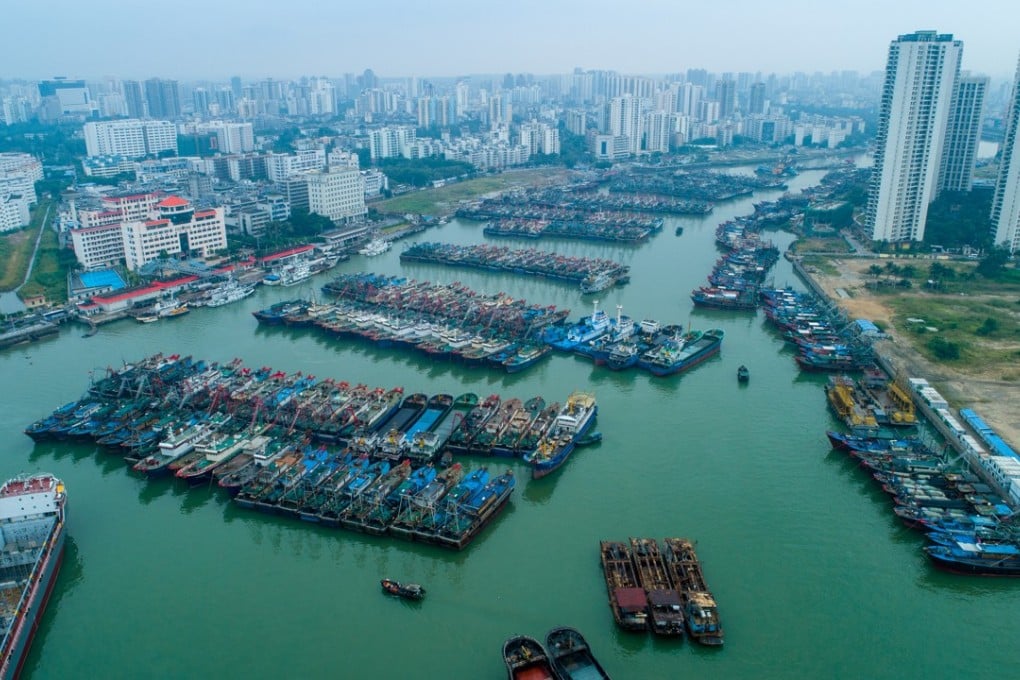 Fishing boats shelter in the harbour in Haikou, Hainan province, on Thursday in preparation for the arrival Typhoon Barijat and Super Typhoon Mangkhut. Photo: ImagineChina