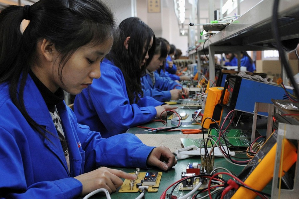 Guangdong has announced a series of measures to bring down business costs amid a growing threat to its industrial base. Photo: Reuters