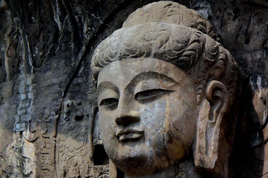 Did a Buddha head withdrawn from sale at a Sotheby’s auction originate from China’s world cultural heritage Longmen Caves in central China's Henan Province? Photo: Xinhua