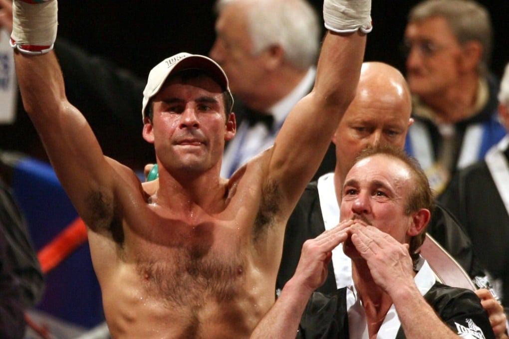 Joe Calzaghe and his trainer father Enzo celebrate after winning the bout against Denmark’s Mikkel Kessler in 2007. Photo: AP