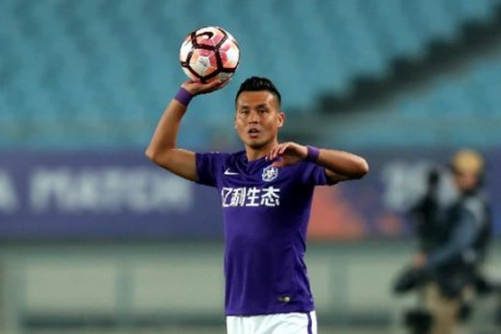 Tianjin Teda’s Mirahmetjan Muzepper recently became the first ethnic Uygur footballer to play for the national team. Photo: AFP