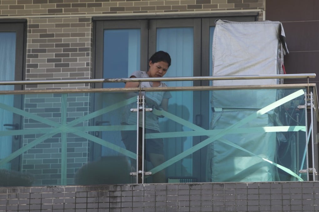 Experts are split on the benefits of taping windows ahead of storms. Photo: Winson Wong