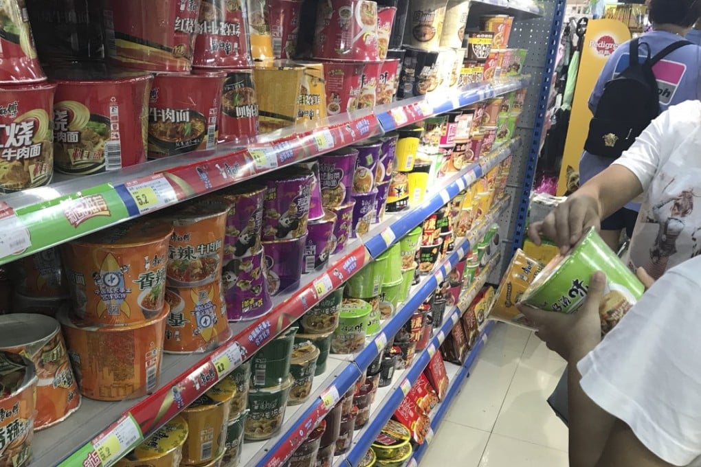 Instant noodles were a popular choice as people in Zhuhai stockpiled food on Saturday in preparation for the arrival of Super Typhoon Mangkhut. Photo: Phoebe Zhang