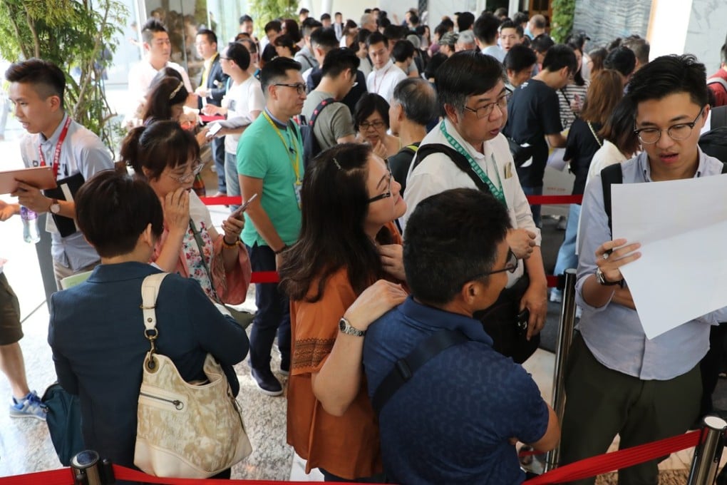 Thousands of potential buyers line up at the sales launch of Nan Fung Development’s LP6 development in Tseung Kwan O on 15 September 2018, during the calm before Super Typhoon Mangkhut made landfall in Hong Kong. Photo: SCMP/ Edward Wong