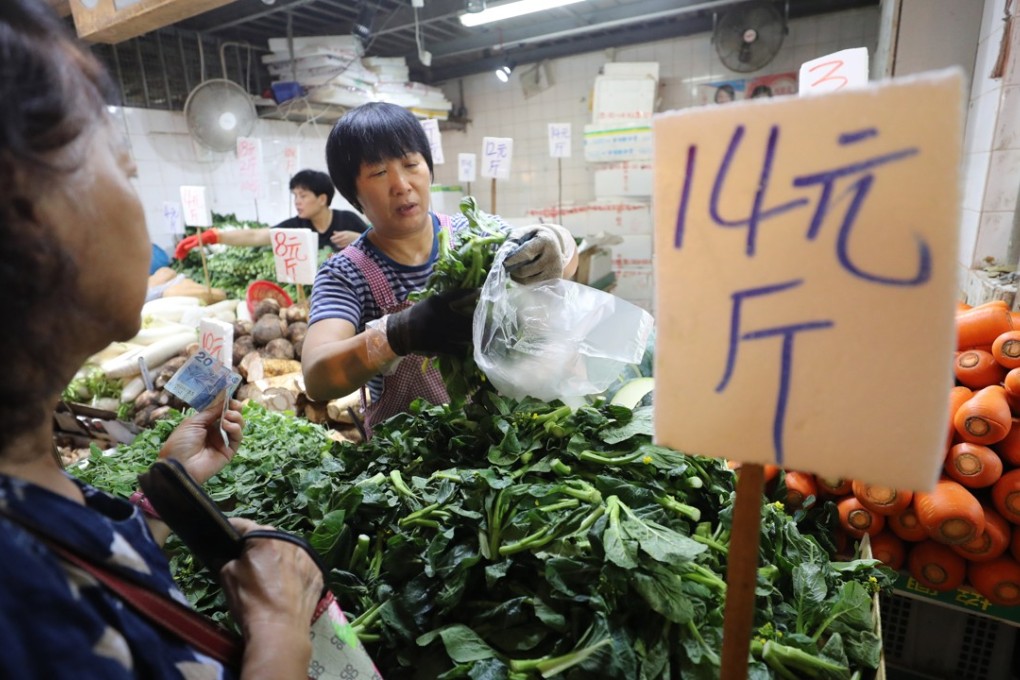 Sales were brisk at Pei Ho Street Market in Sham Shui Po, on September 13, with shoppers stocking up as Typhoon Mangkhut approached. Photo: Winson Wong