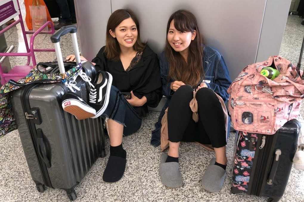 Japanese tourists Haruka Koizumi (left) and Arisu Miyamoto. Photo: Jane Zhang