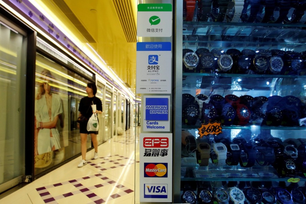 The Faster Payment System will be available from September 30 in Hong Kong. Photo: Reuters