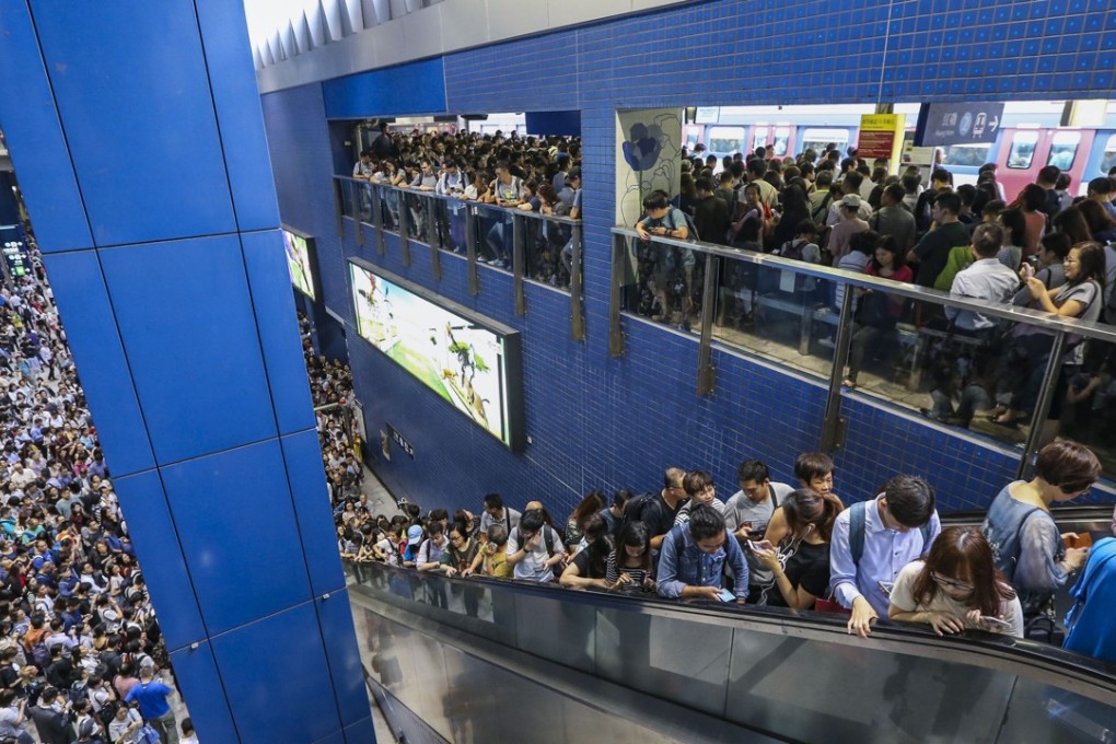Commuters were stranded for hours at Tai Wai MTR Station on the early morning on Monday September 17, 2018 after Typhoon Mangkhut hit Hong Kong on Sunday September 16, 2018 causing disruptions on some train lines. 17SEP18 SCMP / Felix Wong