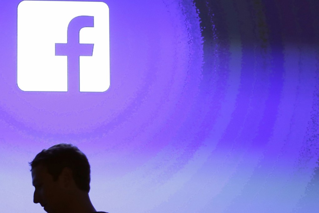 Facebook CEO Mark Zuckerberg walks beside the company’s logo at its headquarters in Menlo Park, California. Zuckerberg recently denied allegations that Facebook discriminates against conservative content after US President Donald Trump accused it, Google and Twitter of bias against him and other Republicans. Photo: AP