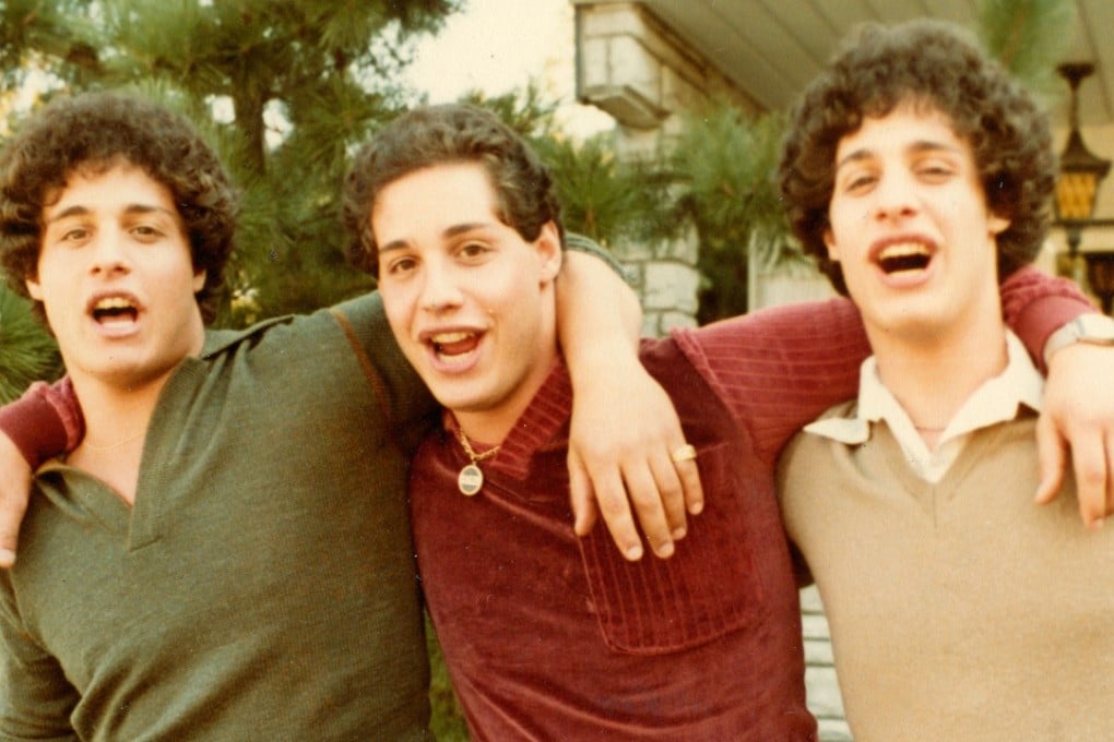 A still from Three Identical Strangers, a documentary about three brothers separated at birth and raised by different families who are reunited at the age of 19.