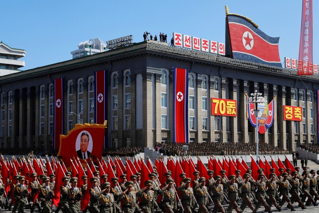 Soldiers march with the portrait of North Korean founder Kim Il-sung during a military parade marking the 70th anniversary of country's foundation in Pyongyang, North Korea, on September 9. Photo: Reuters