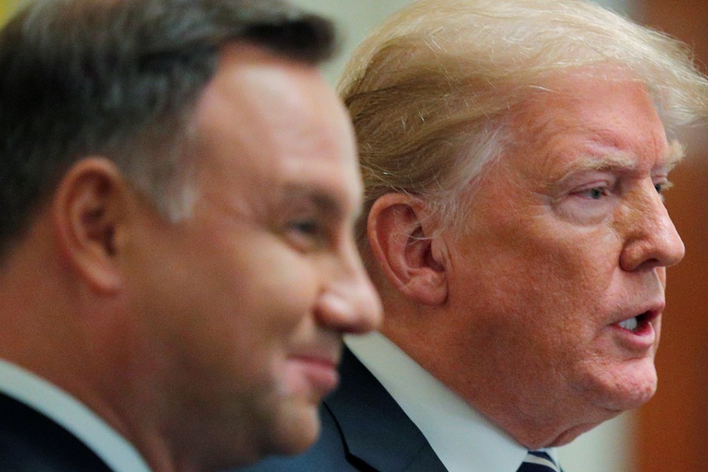 US President Donald Trump (right) stands with Poland’s President Andrzej Duda at the conclusion of a joint news conference in the East Room of the White Houseon Tuesday. Photo: Reuters