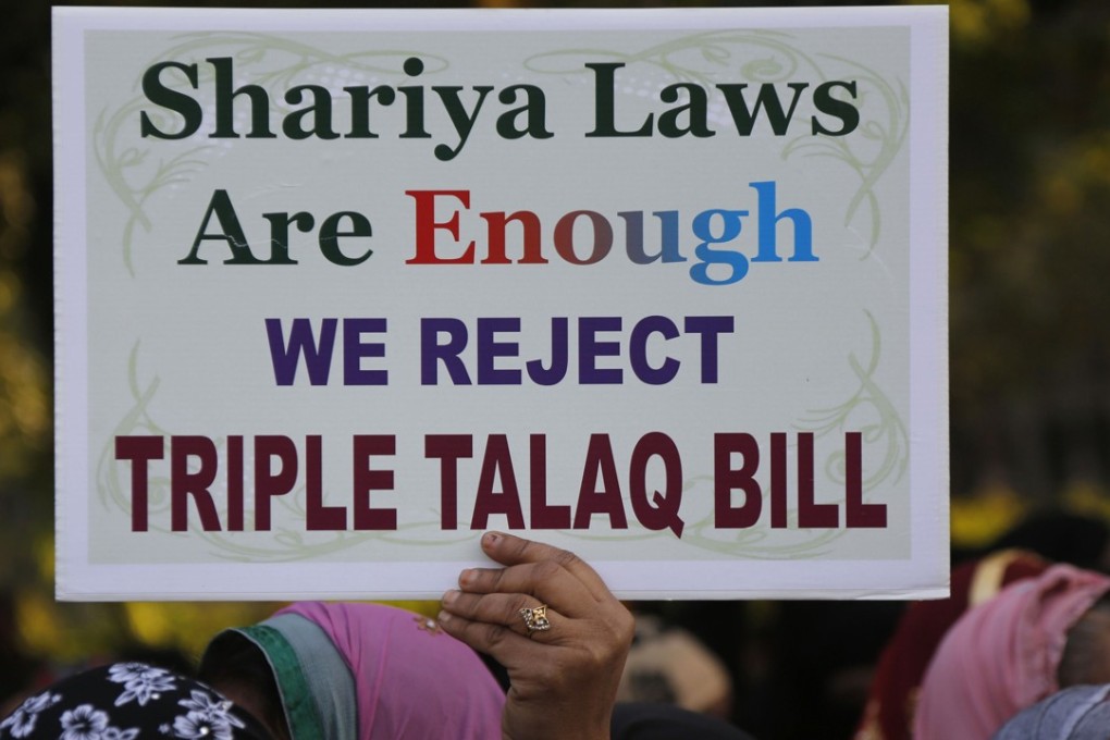 An Indian Muslim woman protests against a new draft law aimed at banning “Triple Talaq,” a Muslim practice of instant divorce. Photo: AP