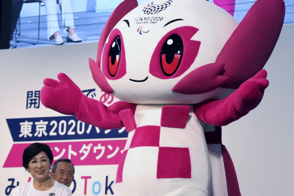 Paralympic mascot “Someity” strikes a pose as Yuriko Koike, the Governor of Tokyo, looks on during a countdown event in Tokyo on August 25. Photo: AP