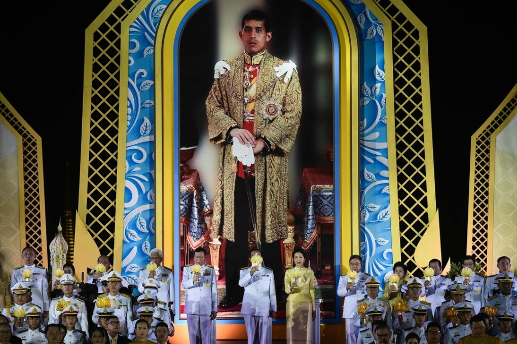 Six young Thais accused of setting portraits of the current and previous king on fire have been granted rare acquittals, their lawyer says. Photo: AFP