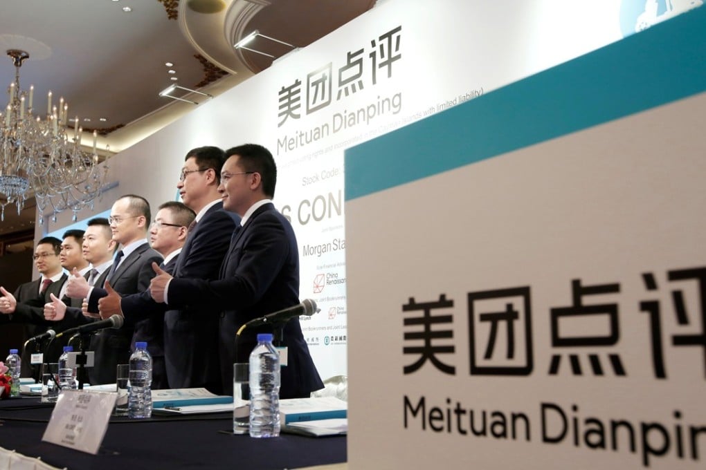 The management team of China's Meituan Dianping, an online food delivery-to-ticketing services platform, attends a news conference on its IPO in Hong Kong on September 6, 2018. The person in the middle is Wang Xing, the co-founder and CEO of Meituan. Photo: Reuters