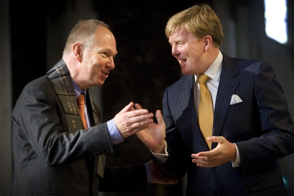 In this file photo taken on November 7, 2008, British/Dutch writer and journalist Ian Buruma (left) receives the Erasmus Prize from Dutch Crown Prince Willem-Alexander in Rotterdam. Buruma, the editor of the prestigious New York Review of Books, has left his position after being roundly criticised for publishing an essay by Canadian Jian Ghomeshi, who lost his high-profile job with CBC after more than 20 women accused him of sexual misconduct. Photo: Agence France-Presse