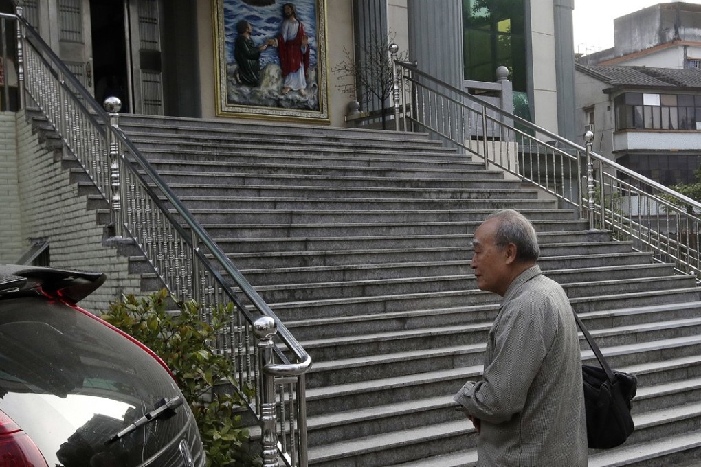 Bishop Peter Zhuang Jianjian outside the Hepo underground Catholic church in Jiexi county, Guangdong province in March. Zhuang was one of two underground bishops who were asked to step down by the Vatican. Photo: AP