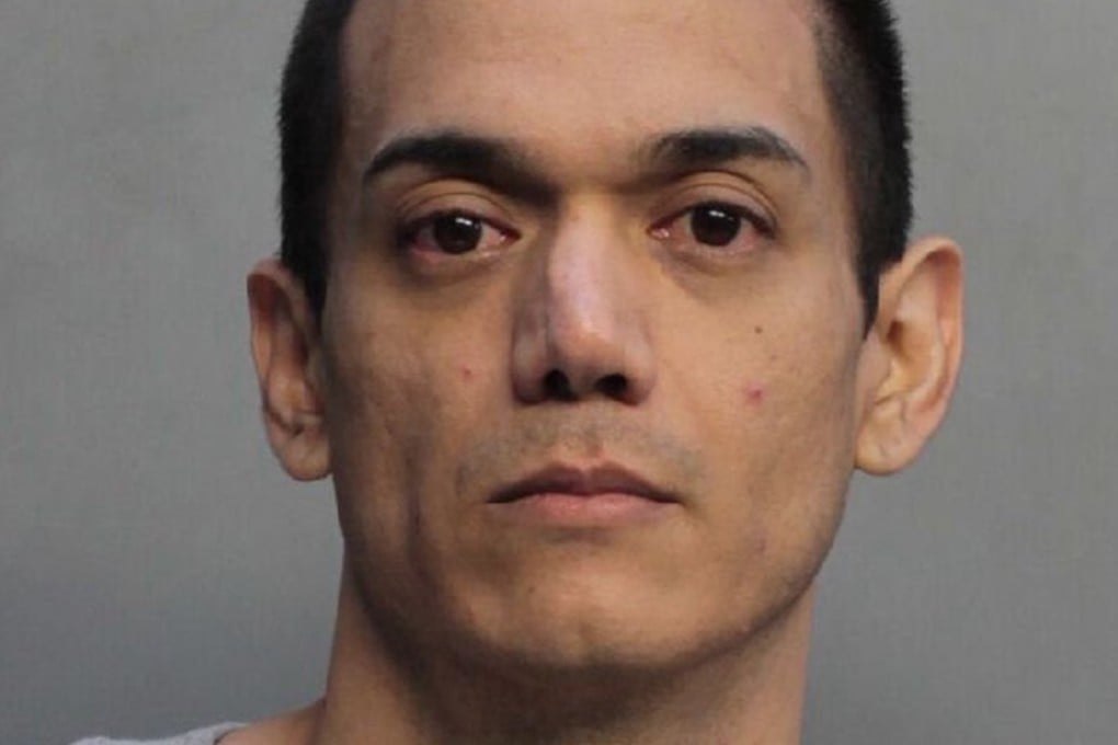 Bryan Deneumostier, in a police mugshot. Photo: Miami-Dade Police