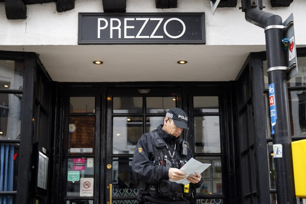 A policeman standing outside Prezzo restaurant in Salisbury where a ‘medical incident’ was reported on September 16. Photo: EPA