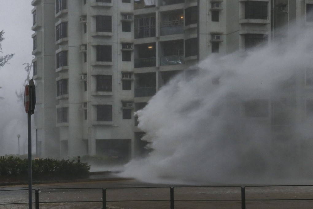 Waves whipped up by Typhoon Mangkhut pound the Heng Fa Chuen harbourside housing estate on Hong Kong Island, on September 16. Photo: Sam Tsang
