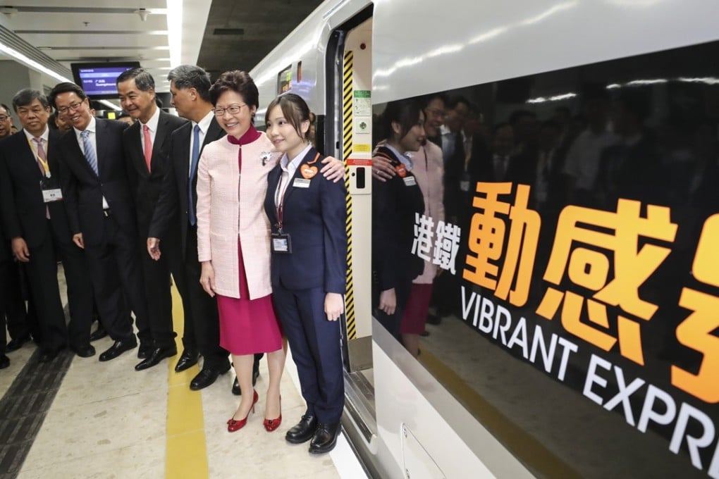 Chief Executive Carrie Lam (second from right) poses with guests before setting off on the first cross-border train. Photo: Edward Wong