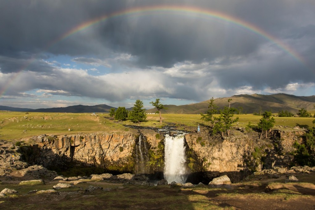 A rainbow over Orkhon Waterfall in Mongolia. One of five remote destinations you should travel to in Asia. Photo: Alamy