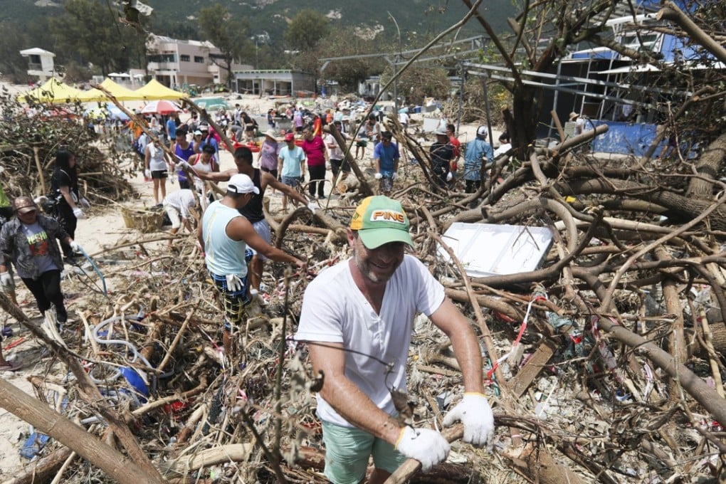 Volunteers clearing rubbish at Shek O Beach on Hong Kong Island in the wake of Typhoon Mangkhut. Photo: Xiaomei Chen