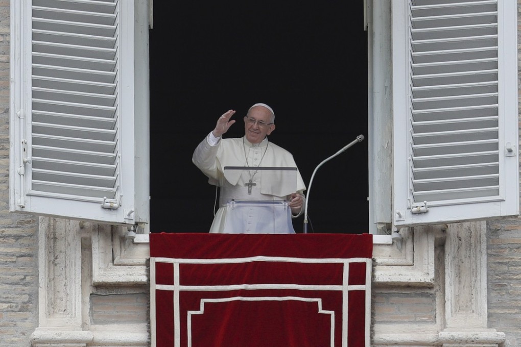 Pope Francis delivers a blessing from his studio's window overlooking St. Peter's Square at the Vatican on September 9, 2018. Photo: AP
