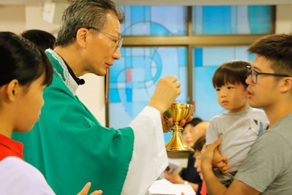 Worshippers at masses in Hong Kong and Taiwan on Sunday were largely upbeat about a new deal between China and the Vatican. Photo: AFP