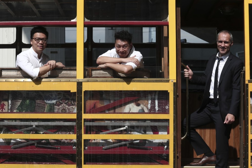 Alvin Yip (left) and Rex Lau (centre) from Circus Tram with Cyril Aubin of Hong Kong Tramways. Photo: Jonathon Wong