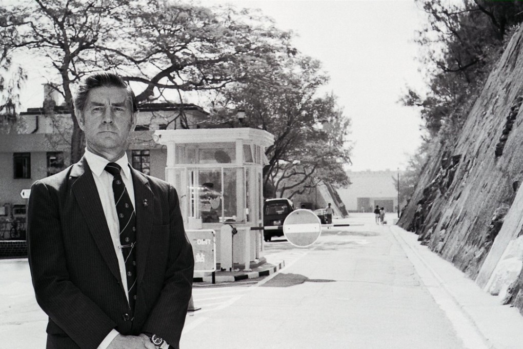 John Fleming at the gates to Stanley Prison, where he served as a hangman in the 1960s. Picture: SCMP