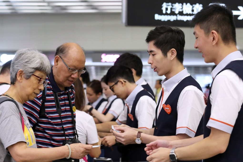 The new West Kowloon terminus buzzing with activity as cross-border high-speed rail services opened to the public. Photo: Felix Wong