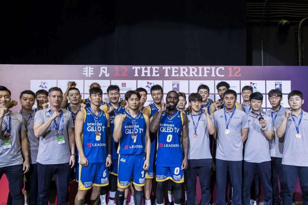 Seoul Samsung Thunders players celebrate winning their medal match against Nagoya Diamond Dolphins. Photo: Asia League