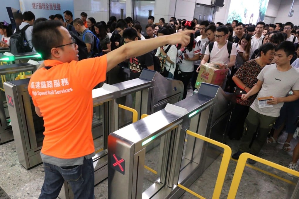 Passengers at the West Kowloon terminus of the high-speed rail link on its opening day. Photo: Felix Wong