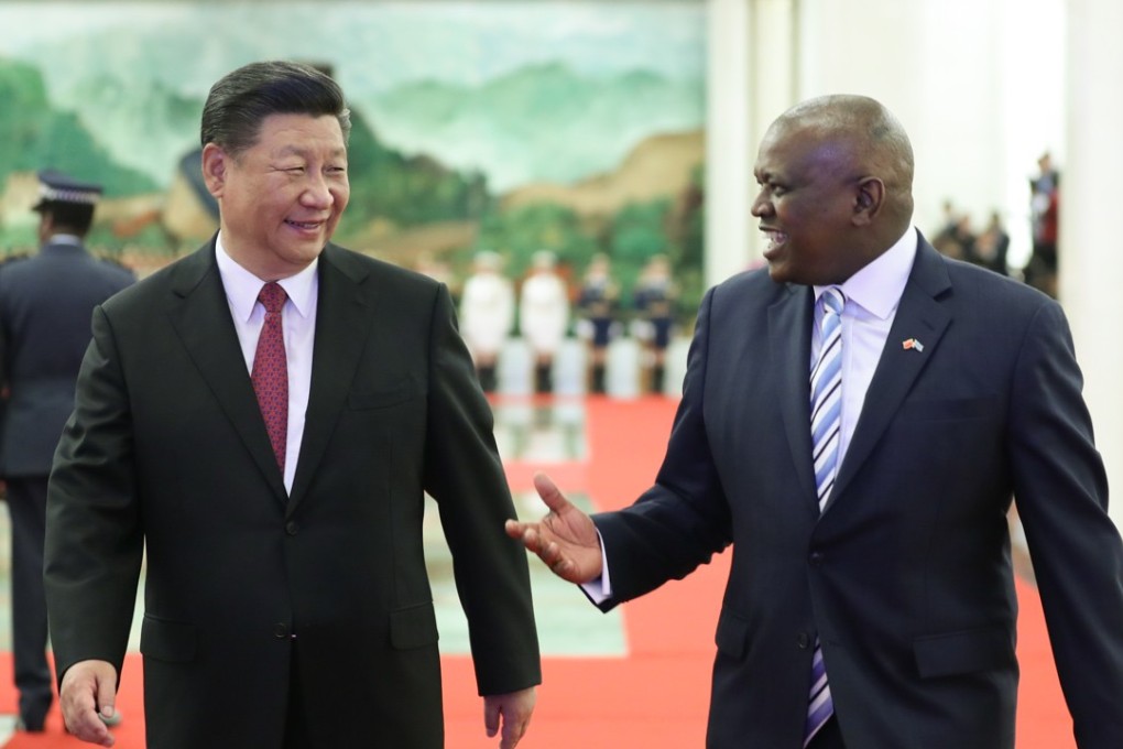 Chinese President Xi Jinping (left) shares a light moment with Botswana’s President Mokgweetsi Masisi before their talks at the Great Hall of the People in Beijing on August 31. Photo: Xinhua