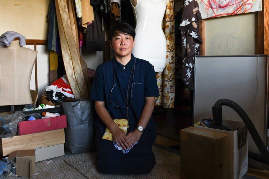Jeongja Han, director of Tail Project, a company that specialises in cleaning out and disposing of property accumulated by the deceased, after completing a clean-out job. Pictures: Noriko Hayashi for Bloomberg Businessweek