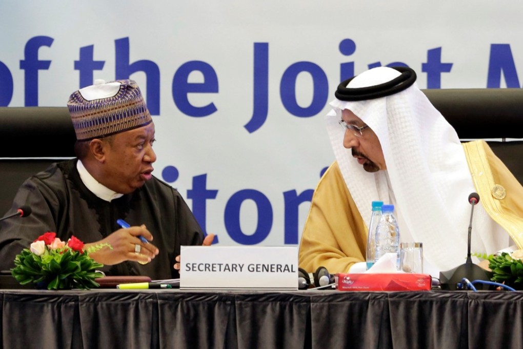 OPEC Secretary-General Mohammed Barkindo, left, with Saudi Arabian Energy Minister Khalid al-Falih during the inaugural session ceremony of the OPEC Ministerial Monitoring Committee in Algiers, Algeria, on Sunday. Photo: Reuters