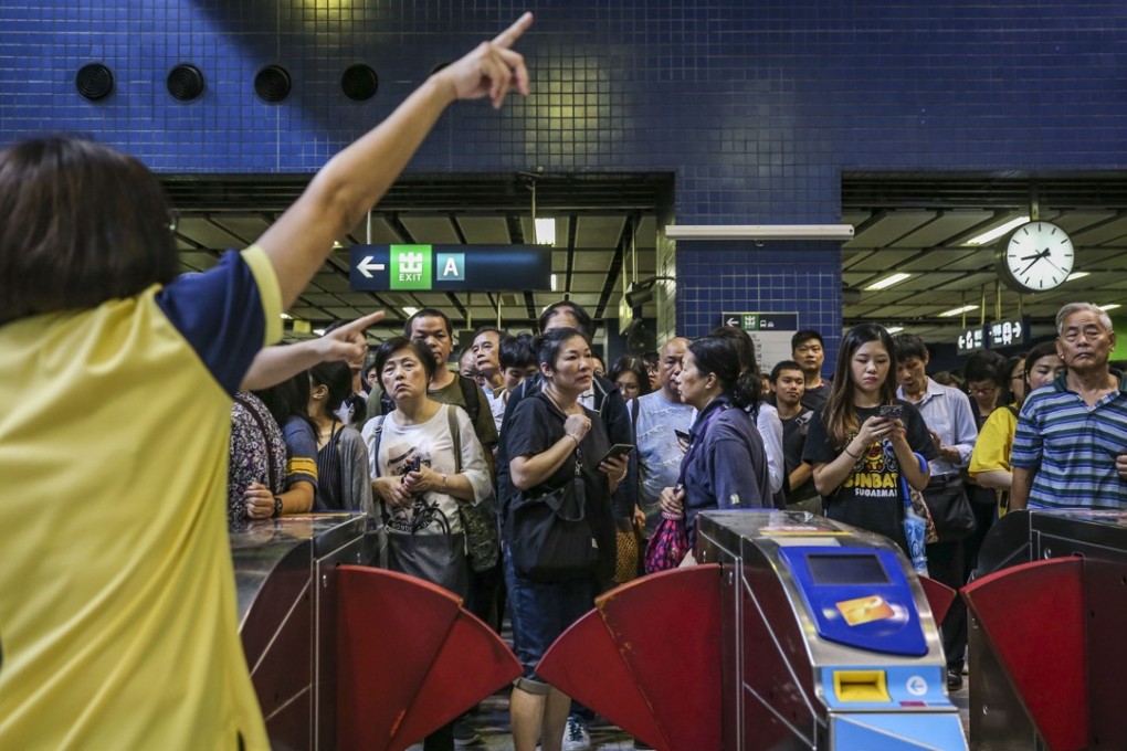 Commuters stranded at Tai Wai MTR Station on the morning of September 17, amid disruptions and delays in rail services due to damage caused by Typhoon Mangkhut a day earlier. Photo: Sam Tsang