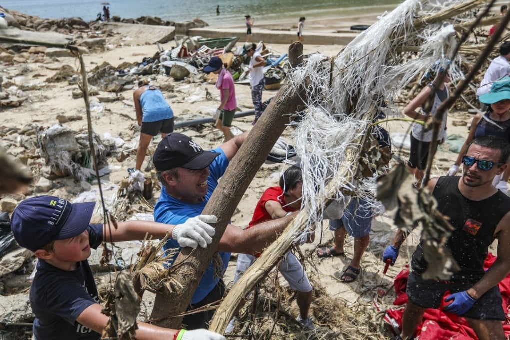 Shek O villagers and volunteers clean up debris and fallen trees on September 22 in the wake of Typhoon Mangkhut. Photo: Xiaomei Chen