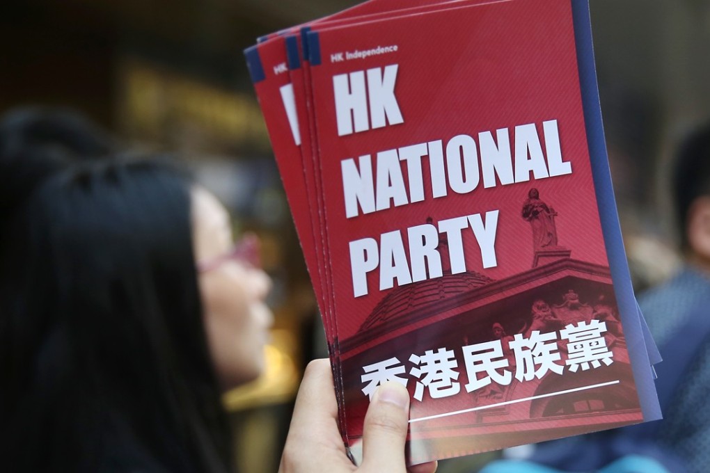 Members of the Hong Kong National Party hand out leaflets to the public. Photo: Sam Tsang