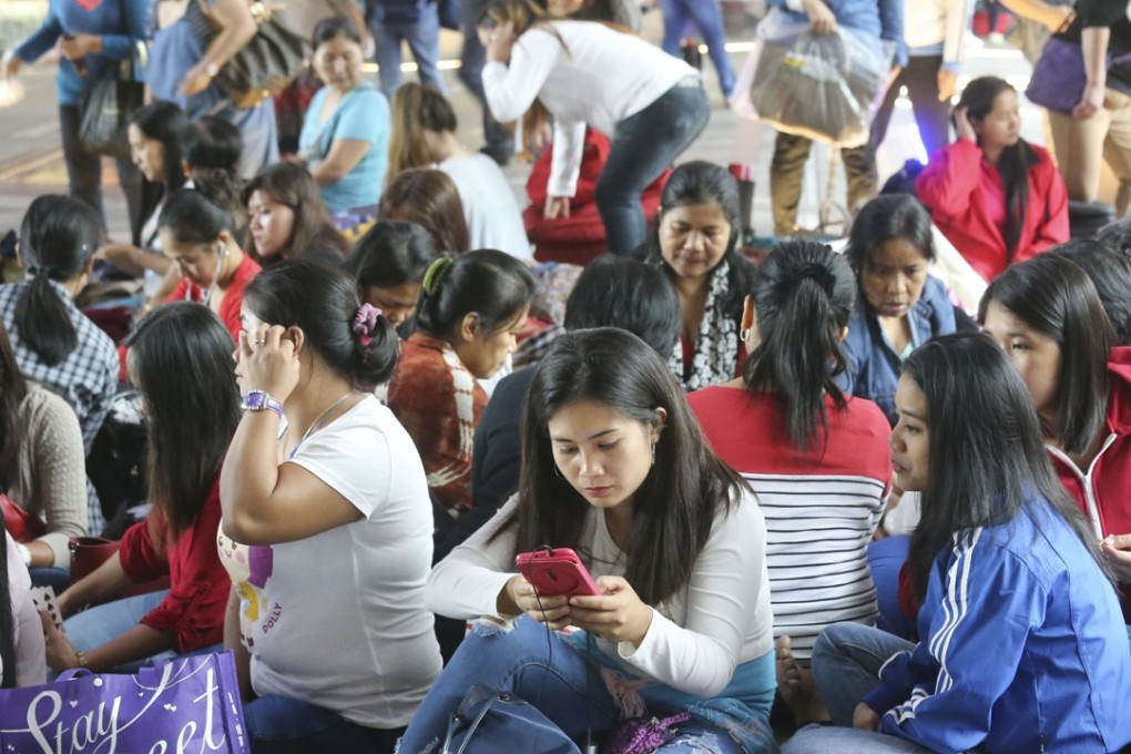 The government says the legal minimum wage strikes a balance between the livelihood of domestic helpers and affordability for poor employers. Photo: Dickson Lee