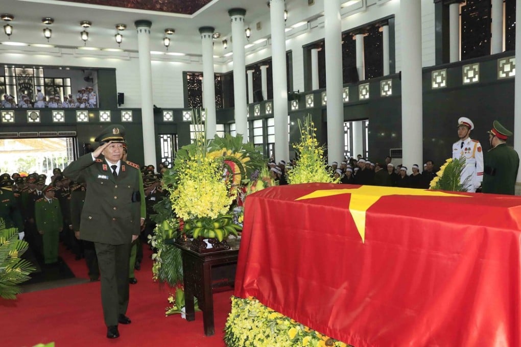 Vietnam's Minister of Public Security To Lam pays respect at the funeral of late President Tran Dai Quang. Photo: EPA