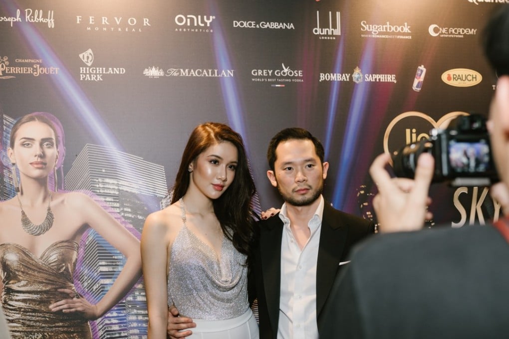 Darren Chan, the Sugarbook founder, and his girlfriend Charmaine at The Fast Lane party. Chan was inspired to create Sugarbook as his friends often teased Charmaine, who is 10 years younger than him. Photo: Resty Woro Yuniar