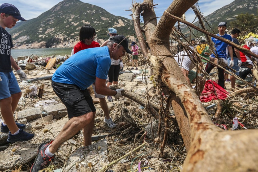 Shek O villagers and volunteers clean up debris and trees after Typhoon Mangkhut wreaked havoc on Hong Kong. Photo: Xiaomei Chen