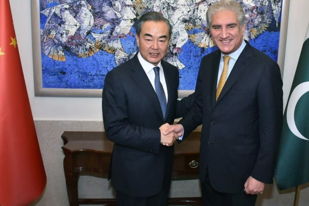 Wang Yi and Shah Mehmood Qureshi meet in Islamabad this month. Qureshi told Wang on Tuesday that Islamabad would ensure security along the economic corridor. Photo: EPA-EFE