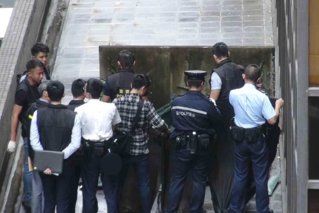 A man’s body was found on the building podium. Photo: Handout