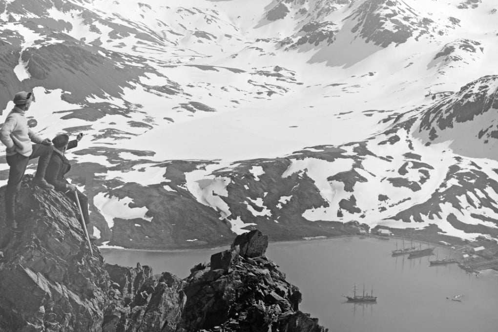 Frank Worsley and Lionel Greenstreet looking across South Georgia harbour. Ernest Shackleton’s ship, ‘The Endurance’, is in the bay below. Frank Hurley’s famous photos will be on display this Friday in Central, Hong Kong. Photo: RGS-IBG