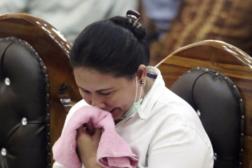 Ethnic Chinese woman Meiliana weeps during her sentencing hearing at a district court in Medan, North Sumatra, Indonesia. Photo: AP