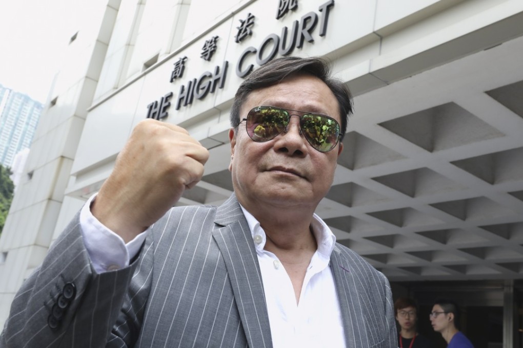 Wong Yuk-man all-smiles outside the High Court on Thursday. Photo: Dickson Lee